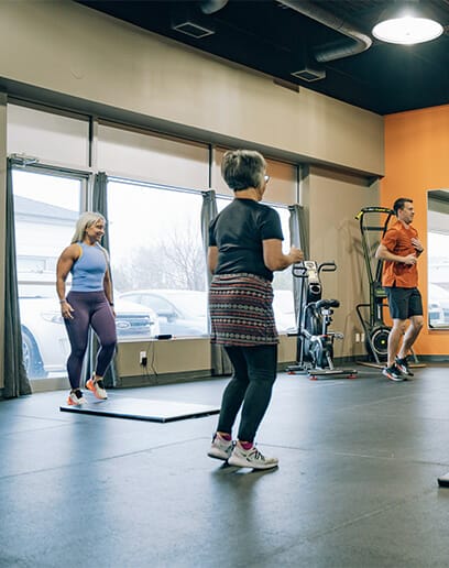 people training together at the gym